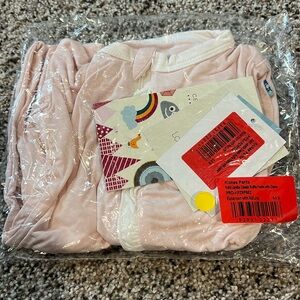 NIB kickee pants zippered ruffle footie in macaroon and natural. Size 0-3M